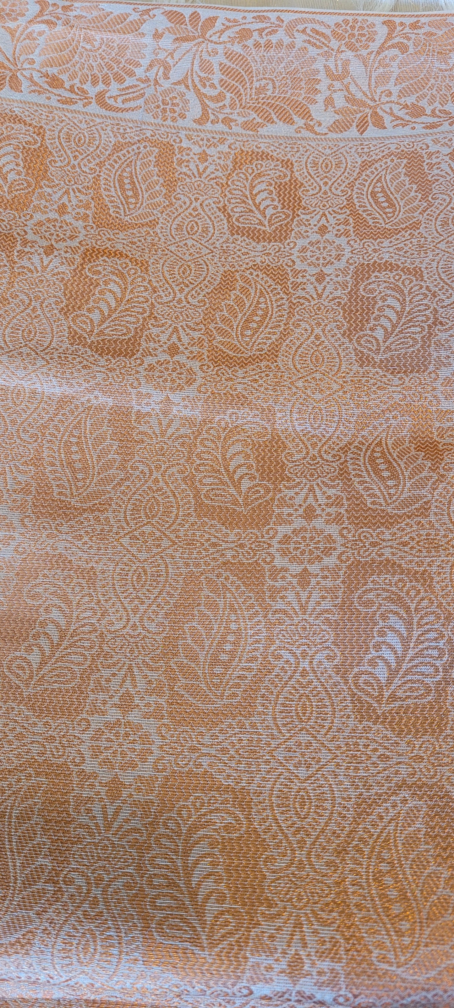 Golden semi tissue saree with copper zari work