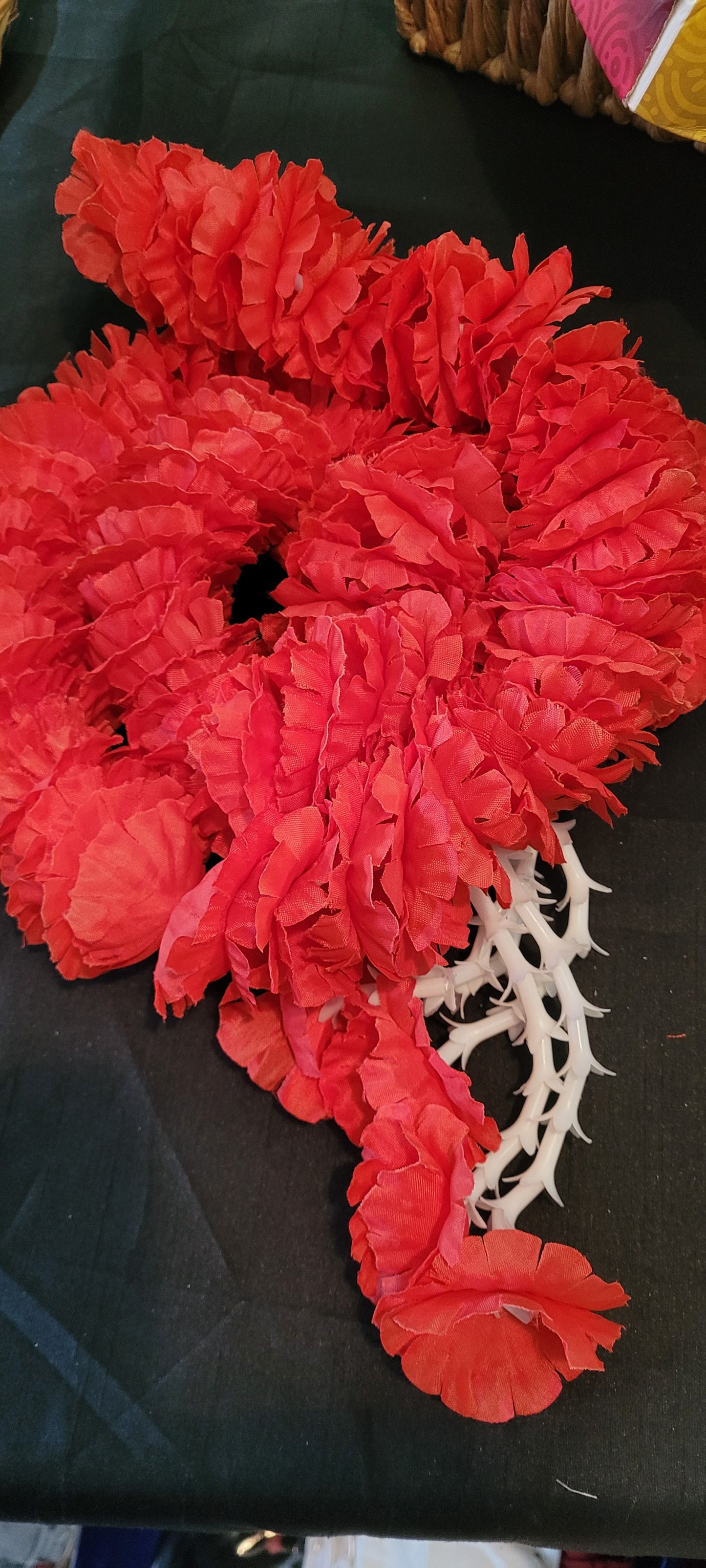 Red flower strings with white tassels 8 feet long