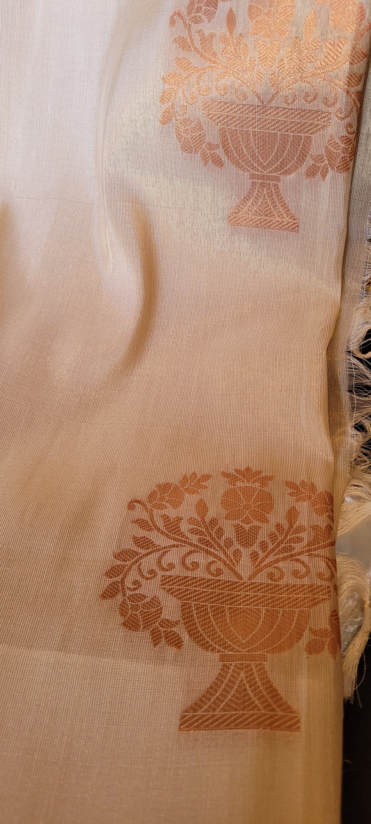 Golden semi tissue saree with copper zari work