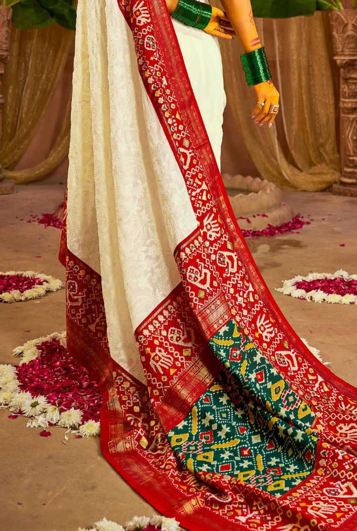 Lucknowi with patola border saree