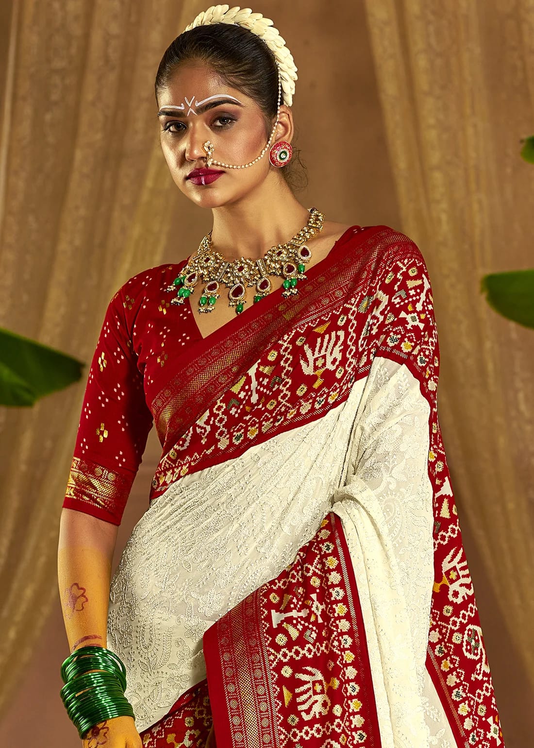 Lucknowi with patola border saree