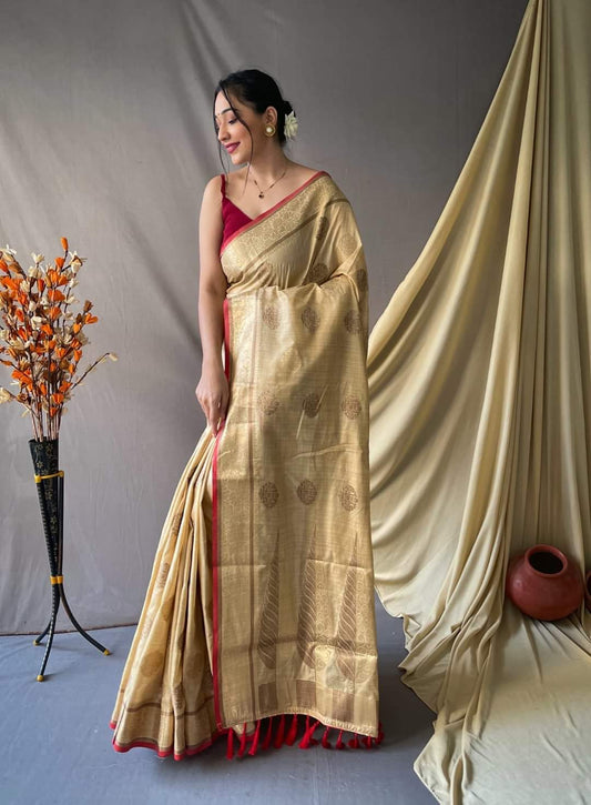 Soft silk saree with golden zari work and beautiful tassels