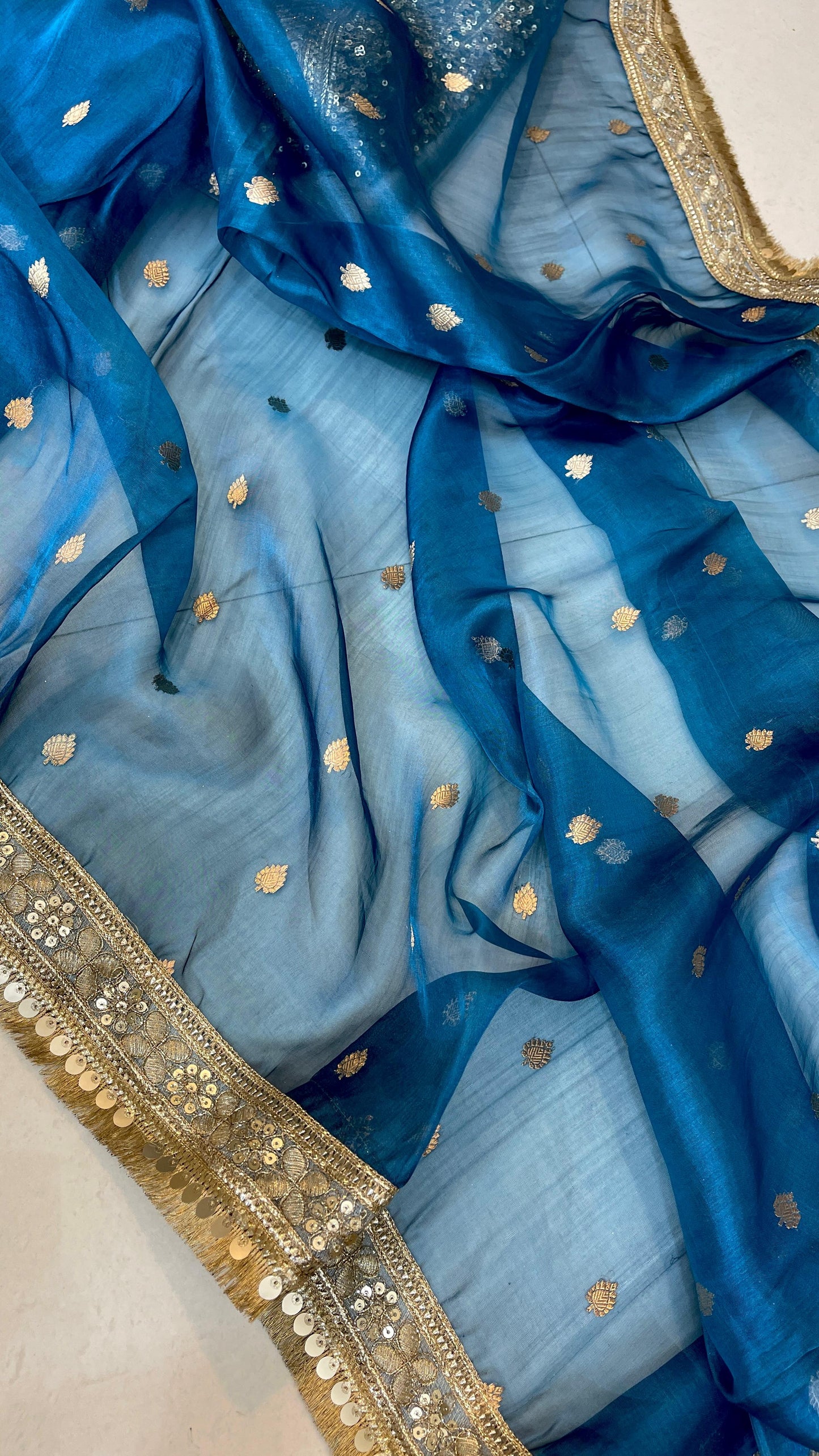 Pure kora muslin with a zari piping border